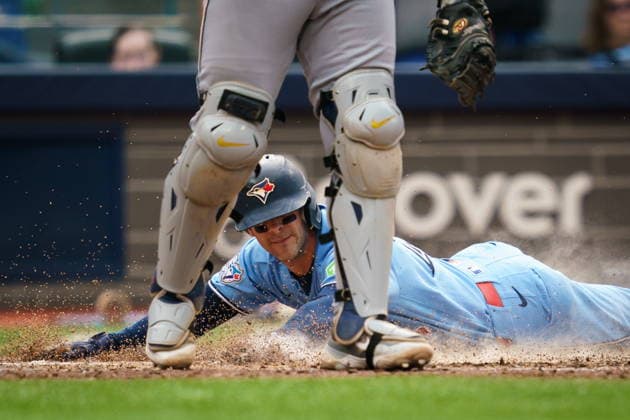 September 16, 2026, Toronto, On, Canada: Toronto Blue Jays second baseman Ernie Clement (22) slides in safe past Detroit Tigers catcher Dillon Dingler (13) on an error to score a run during sixth inning MLB, Baseball Herren, USA action in Toronto, on Wednesday, Sept. 16, 2026. Canada News - September 16, 2026  - ZUMAc35_ 20260916_zaf_c35_165 Copyright: xKeitoxNewmanx