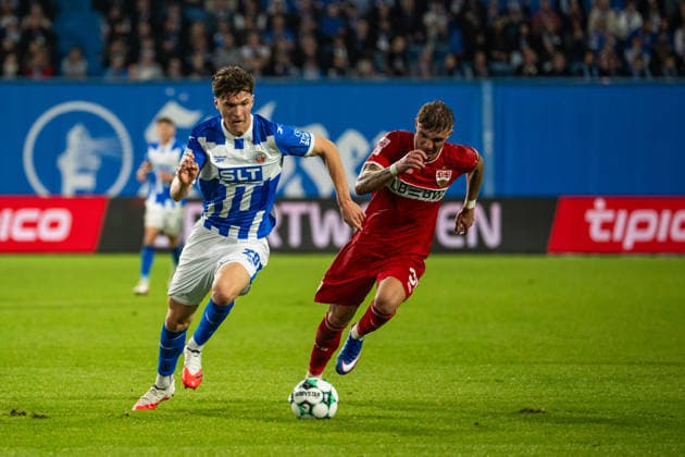 Rostock, Germany, September 16, 2026, 3rd League 2026–2027, Matchday 6: FC Hansa Rostock vs. VfB Stuttgart II. Pictured from left, in a tackle: Peter Kiedl (Hansa Rostock) and Veit Stange (VfB Stuttgart II). DFB and DFL regulations prohibit any use of photographs as image sequences and or quasi-video Copyright: xFotostandx xVoelkerx