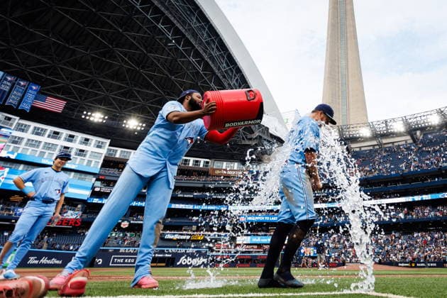 September 16, 2026, Toronto, On, Canada: Toronto Blue Jays Vladimir Guerrero Jr., centre, douses Myles Straw, right, with sports drink after defeating the Detroit Tigers 5-1 during MLB, Baseball Herren, USA action in Toronto, on Wednesday, Sept. 16, 2026. Canada News - September 16, 2026  - ZUMAc35_ 20260916_zaf_c35_178 Copyright: xKeitoxNewmanx