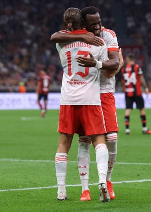 AC Milan v Benfica - UEFA Europa League - Season 2026-2027 Milan, Italy, 16th September 2026. Jakub Kaminski of SL Benfica celebrates with team mate Dodi Lukebakio after scoring to give the visitors a 2-0 lead during the AC Milan vs SL Benfica UEFA Europa League, League Phase match at Giuseppe Meazza, Milan. Picture credit should read: Jonathan Moscrop Milan Stadio Giuseppe Meazza Italy