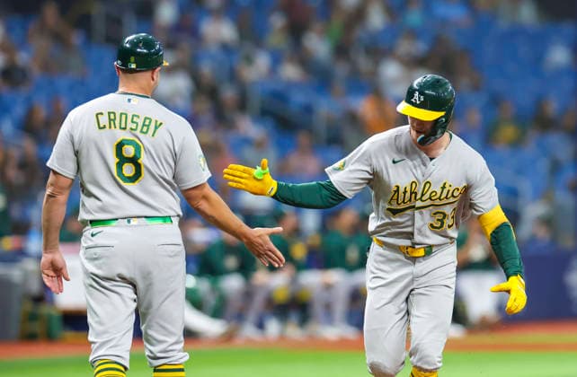 September 16, 2026, St. Petersburg, Florida, USA: Athletics center fielder Henry Bolte (33) is congratulated by Athletics third base coach Bobby Crosby (8) after hitting a solo homer in the third inning against the Tampa Bay Rays in a Major League Baseball game between the Tampa Bay Rays and the Athletics Wednesday, Sept. 16, 2026 in St. Petersburg, Florida. St. Petersburg USA - ZUMAu321 20260916_zsp_u321_001 Copyright: xChrisxUrsox