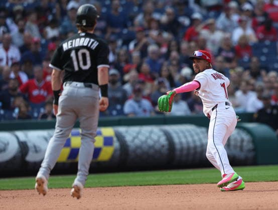 Cleveland Guardians Jose Ramirez (11) looks to throw to first base as Chicago White Sox Chase Meidroth (10) jumps in the air to distract him during the seventh inning at Progressive Field in Cleveland, Ohio on Wednesday, September 16, 2026.The Guardians defeated the White Sox 6-3 to take the lead in the Central Division.  CLE20260916116 AARONxJOSEFCZYK