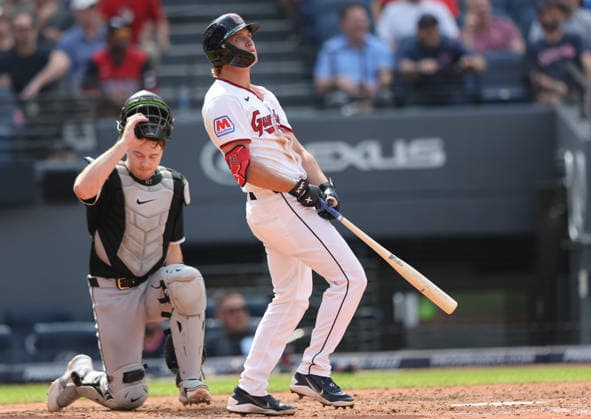 Cleveland Guardians Petey Halpin (0) watches the ball leave the park for a three run home run in the sixth inning as Chicago White Sox Kyle Teel (8) reacts at Progressive Field in Cleveland, Ohio on Wednesday, September 16, 2026.The Guardians defeated the White Sox 6-3 to take the lead in the Central Division.  CLE20260916121 AARONxJOSEFCZYK