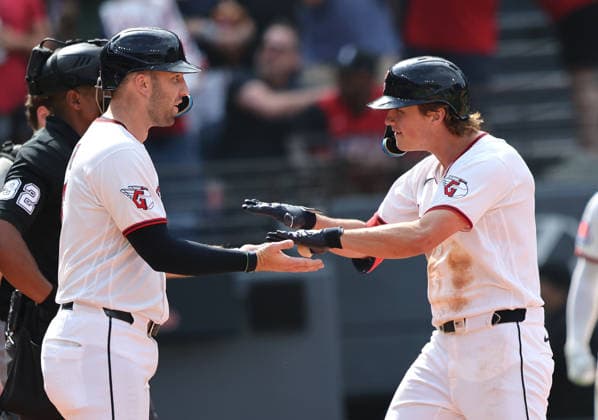 Cleveland Guardians Petey Halpin (0) celebrates his three run home run in the sixth inning against the Chicago White Sox with David Fry (6) at Progressive Field in Cleveland, Ohio on Wednesday, September 16, 2026.The Guardians defeated the White Sox 6-3 to take the lead in the Central Division.  CLE20260916122 AARONxJOSEFCZYK