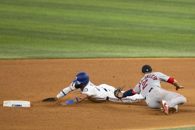 September 16, 2026, Arlington, Texas, USA: iTexas Rangers shortstop EZEQUIEL DURAN (20) gets tagged out by Boston Red Sox second baseman ISIAH KINER-FALEFA (2) while attempting to steal second base at Globe Life Field. Rangers win 7-3, Arlington USA - ZUMAf180 20260916_zsp_f180_011 Copyright: xMarkxFannx