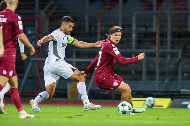 September 16, 2026, xsefx, Soccer, SC Fortuna Köln vs. SV Wehen Wiesbaden, 3rd Division, South Division, Matchday 6, 2026–2027 Season: Tarik Gözüsirin of SV Wehen Wiesbaden (No. 11) in a tackle against Bennit Bröger of Fortuna Cologne (No. 38). DFB regulations prohibit any use of photographs as image sequences and or quasi-video. North Rhine-Westphalia, Germany