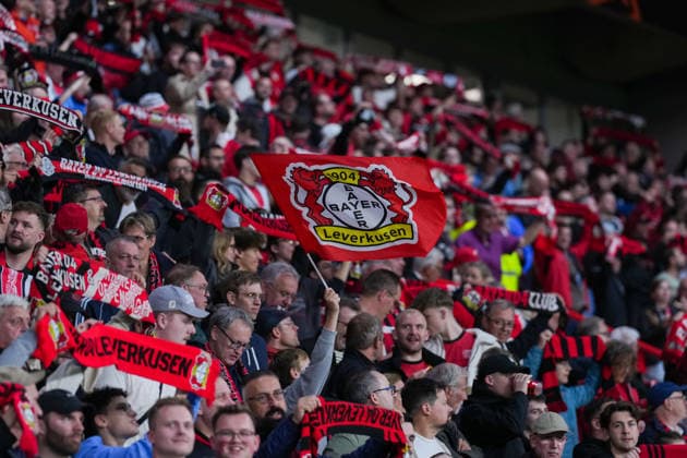 September 16, 2026, xydrx, Men s, Soccer, Europa League, Bayer 04 Leverkusen vs. NK Celje, 2026–2027 Season, BayArena: Bayer 04 Leverkusen fans hold up scarves and wave a flag. Regulations prohibit any use of photographs as image sequences and or quasi-video. Copyright: HMBxMedia YannisxDreimann