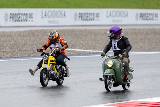 MOTORSPORTS - MotoGP, GP of Austria 2026 SPIELBERG,AUSTRIA,17.SEP.26 - MOTORSPORTS - MotoGP, Grand Prix of Austria, Red Bull Ring, preview, MopedGP. Image shows Pol Espargaro and a participant. Keywords: rider.  GEPAxpictures xMaticxKlansek