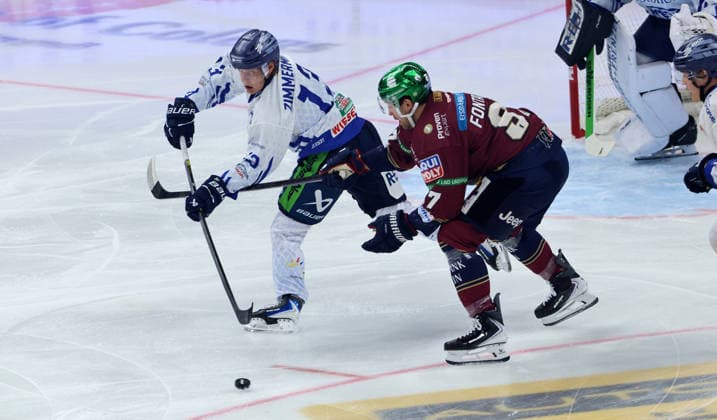 Mario Zimmermann, Gabriel Fontaine: A duel during a game—action in ice hockey—Penny DEL (German Ice Hockey League) Game 1 of the 2026–2027 season, September 17, 2026: EHC Eisbären Berlin (EBB) vs. Straubing Tigers