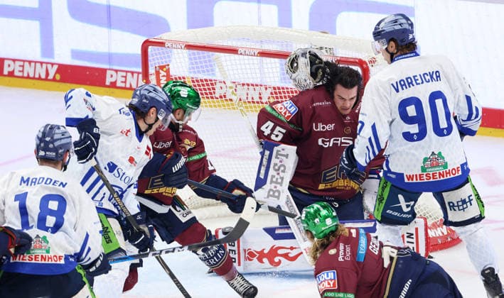 Goaltender Jack LaFontaine loses his helmet in a collision. Game scene. Action. Sports. Ice hockey. Penny DEL. German Ice Hockey League. Game 1. 2026–2027 season. September 17, 2026. EHC Eisbären Berlin (EBB) vs. Straubing Tigers