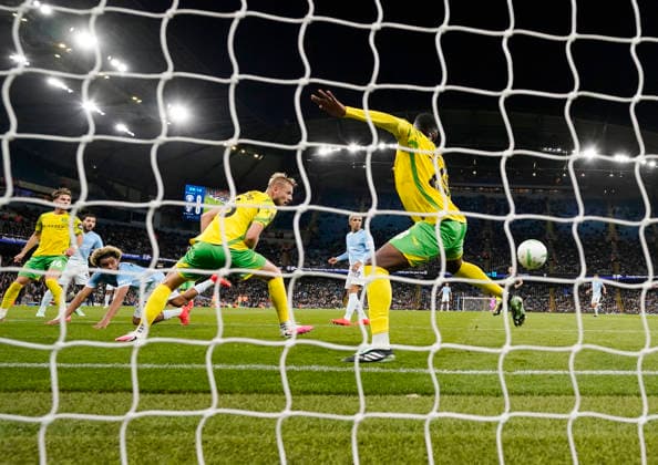 Manchester, England, 17th September 2026. Floyd Samba of Manchester City heads the first goal on his debut during the Manchester City vs Norwich City Carabao Cup match at the Etihad Stadium, Manchester. Picture credit should read: Andrew Yates Sportimage EDITORIAL USE ONLY. No use with unauthorised audio, video, data, fixture lists, club league logos or live services. Online in-match use limited to 120 images, no video emulation. No use in betting, games or single club league player publications. SPI_036_AY_Man_City_Norwich SPI-5003-0037