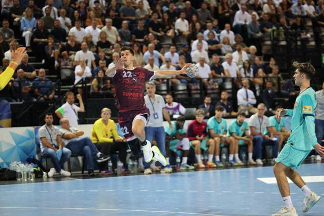 MONTPELLIER BARCELONE Benjamin ELKAIM MAXPPP - montpellier 17 09 2026 Benjamin Richert, joueur du Montpellier Handball (no 22), s eleve avec le ballon lors du match de Ligue des champions face au FC Barcelone a la Sud de France Arena. Champions League montpellier FRANCE  Copyright: xMAXPPPxBenjaminxELKAIMx ELK202609174462 ELK202609174462