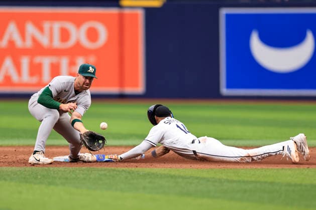 September 17, 2026, St. Petersburg, Florida, USA: Tampa Bay Rays left fielder Chandler Simpson (14) safely steals second base before Athletics second baseman Donovan Walton (29) can tag him during an MLB, Baseball Herren, USA game on September 17, 2026 at Tropicana Field. The Rays beat the Athletics 10-1 and swept the series. MLB 2026: Tampa Bay Rays 10 : 1 Athletics  - ZUMAh180 20260917_zsp_h180_069 Copyright: xKimxHukarix