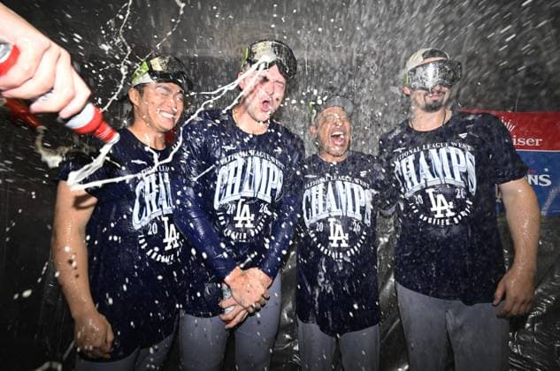 Baseball: Dodgers clinch NL West title (From L) Los Angeles Dodgers Yoshinobu Yamamoto, Tarik Skubal, manager Dave Roberts and Blake Snell celebrate with champagne after the Dodgers clinched their fifth consecutive National League West title with an 8-2 victory over the Cincinnati Reds at Great American Ball Park in Cincinnati, Ohio, on Sept. 17, 2026.  A14AA0005627755P