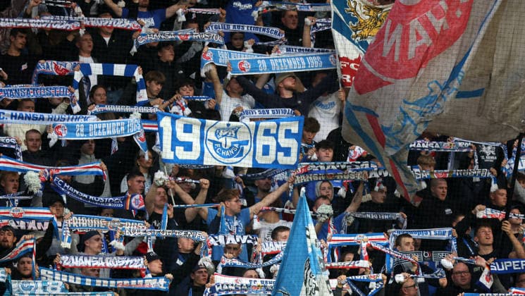 FC Hansa Rostock vs. VFB Stuttgart II, Rostock, September 16, 2026, Soccer, 3rd Division: FC Hansa Rostock vs. VFB Stuttgart II. A traditional club; a fan holding a 1965 banner. FC Hansa Rostock was founded in Rostock at the Ostseestadion in Mecklenburg-Western Pomerania, Germany.