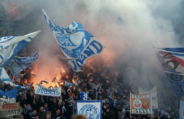 FC Hansa Rostock vs. VFB Stuttgart II, Rostock, September 16, 2026, Soccer 3rd Division, FC Hansa Rostock vs. VFB Stuttgart II, FC Hansa Rostock fans with flags and pyrotechnics, Rostock Ostseestadion, Mecklenburg-Western Pomerania, Germany