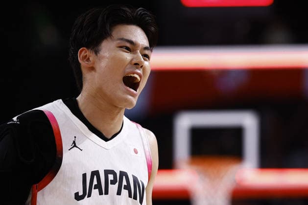 Aichi-Nagoya Asian Games: Basketball Japan s Ren Kanechika shouts following the end of the first quarter of a men s basketball semifinal match against China at the Aichi-Nagoya Asian Games at Aichi International Arena in Nagoya, central Japan, on Sept. 18, 2026.  A14AA0005627839P