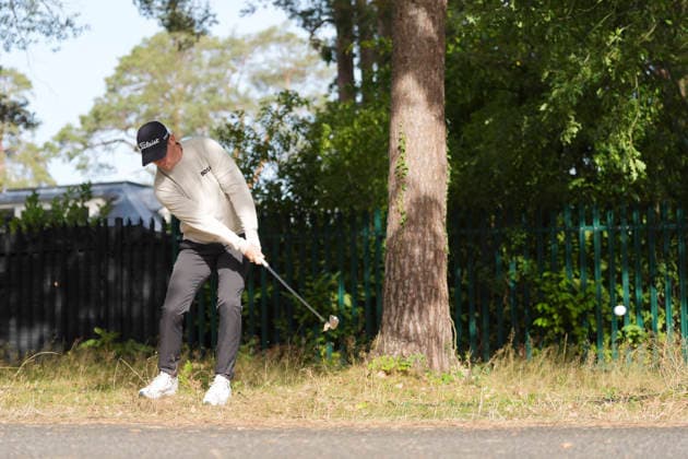 VIRGINIA WATER, ENGLAND - SEPTEMBER 18: Daniel Hillier (NZL) plays from the trees on the 15th hole during Round 2 at the BMW PGA, Golf Herren Championship at Wentworth Golf Club, Virginia Water on September 18, 2026 in Surrey, England The BMW PGA Championship