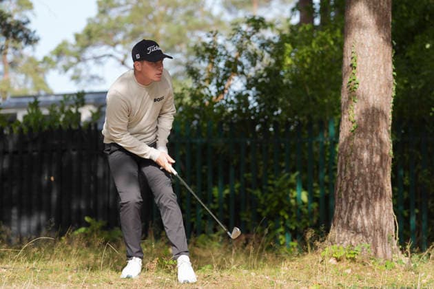 VIRGINIA WATER, ENGLAND - SEPTEMBER 18: Daniel Hillier (NZL) plays from the trees on the 15th hole during Round 2 at the BMW PGA, Golf Herren Championship at Wentworth Golf Club, Virginia Water on September 18, 2026 in Surrey, England The BMW PGA Championship