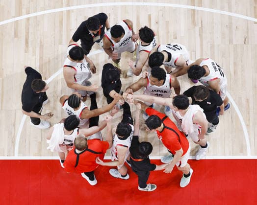 Aichi-Nagoya Asian Games: Basketball Japan players celebrate after beating China in a men s basketball semifinal match at the Aichi-Nagoya Asian Games at Aichi International Arena in Nagoya, central Japan, on Sept. 18, 2026.  A14AA0005627855P