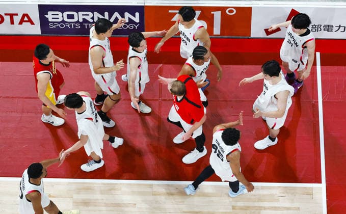 Aichi-Nagoya Asian Games: Basketball Japan players celebrate after beating China in a men s basketball semifinal match at the Aichi-Nagoya Asian Games at Aichi International Arena in Nagoya, central Japan, on Sept. 18, 2026.  A14AA0005627856P