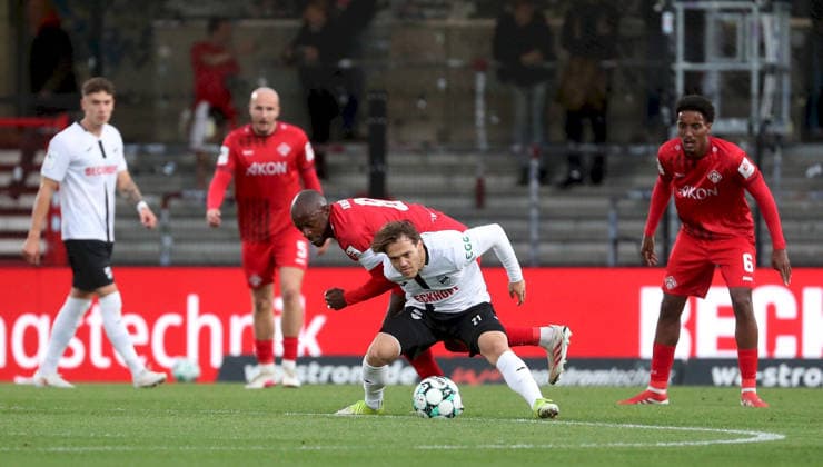 September 18, 2026, xfsx, Men s, Soccer, 2026–2027 Season, 3rd Division, Matchday 7: SC Verl vs. FC Würzburger Kickers; from left: David Kinsombi (FC Würzburger Kickers), Mika Clausen (SC Verl); Verl Sportclub Arena, North Rhine-Westphalia, Germany