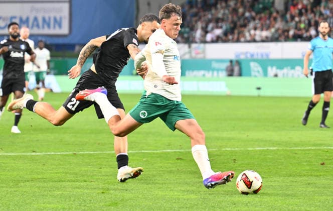 September 18, 2026 Soccer Season 2026–2027, Matchday 2, Bundesliga, SpVgg Greuther Fürth vs. Kleeblatt FC Magdeburg, FCM, Sports Photo by Zink xwoxzix. DFL regulations prohibit any use of photographs as image sequences and or quasi-video For editorial use only: Falko Michel 21, FC Magdeburg; Lukas Reich 2, SpVgg Greuther Fürth