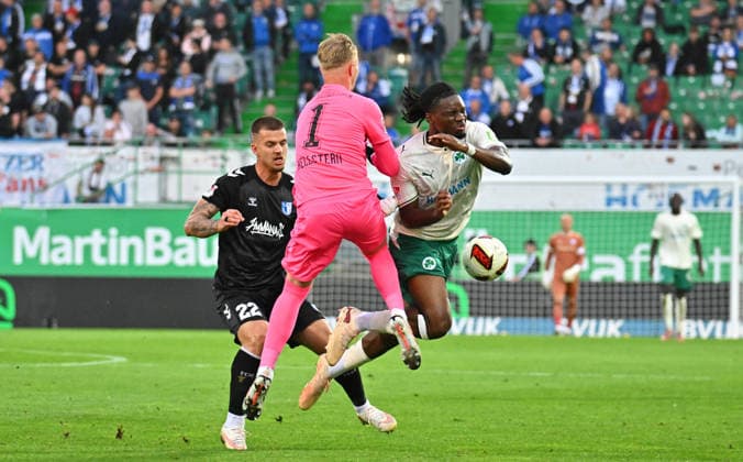 September 18, 2026 Soccer Season 2026–2027, Matchday 2, Bundesliga, Match 06: SpVgg Greuther Fürth vs. Kleeblatt FC Magdeburg, FCM Sports Photo by Zink MeZi xmexzix. DFL regulations prohibit any use of photographs as image sequences and or quasi-video; for editorial use only. Mateusz Zukowski 22, FC Magdeburg; Florian Hellstern 1, SpVgg Greuther Fürth; Hendry Blank 34, SpVgg Greuther Fürth, right