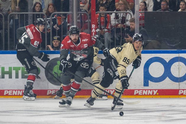 Face-off between Ryan MacInnis of the Cologne Sharks (77) and Matt Choupani of the Wolfsburg Grizzlys (89); Cologne Sharks vs. Wolfsburg Grizzlys, ice hockey, Penny DEL, Matchday 1, 2026–2027 season, September 18, 2026, Cologne Sharks vs. Grizzlys Wolfsburg, Ice Hockey, Penny DEL, Matchday 1, 2026–2027 Season, September 18, 2026, Cologne Copyright: xEibner-Pressefoto ThomasxHaeslerx EP_THR