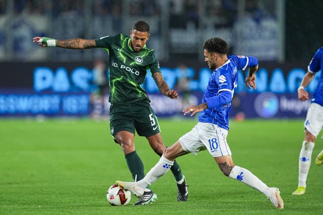 September 18, 2026, xydrx, Men s, Soccer, 2. Bundesliga, VfL Wolfsburg vs. SV Darmstadt 98, 2026–2027 season, Volkswagen Arena, Vinicius Souza Costa (VfL Wolfsburg), No. 5 in a tackle against Raoul Petretta (SV Darmstadt 98), 18. DFB regulations prohibit any use of photographs as image sequences and or quasi-video Copyright: HMBxMedia YannisxDreimann