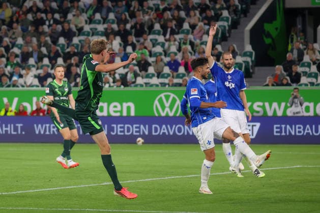 September 18, 2026, xgox, Soccer, 2. Bundesliga, VfL Wolfsburg vs. SV Darmstadt 98, emspor, from left: Goal making it 3–1 by Alexander Bernhardsson (Wolfsburg), 17, Ball not in frame DFL DFB REGULATIONS PROHIBIT ANY USE OF PHOTOGRAPHS as IMAGE SEQUENCES and or QUASI-VIDEO Wolfsburg