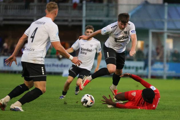 September 18, 2026, Soccer, Men’s, 2026–2027 Season, Bavarian Regional League, Matchday 10: TSV Buchbach vs. FC Schweinfurt 05. From left: Kevin Fery (FC Schweinfurt 05, No. 15) against Daniel Muteba (TSV Buchbach, No. 23). Buchbach SMR Arena, Bavaria, Germany
