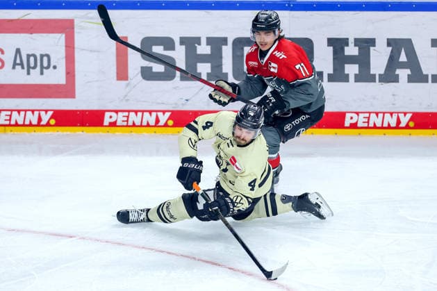 September 18, 2026, Ice Hockey, DEL, Kölner Haie vs. Grizzlys Wolfsburg, Matchday 1, 2026–27 Season, Lanxess Arena, Cologne; Daniel Fischbuch (Kölner Haie 71) in a battle against Keaton Thompson (Grizzlys Wolfsburg 04), North Rhine-Westphalia, Germany