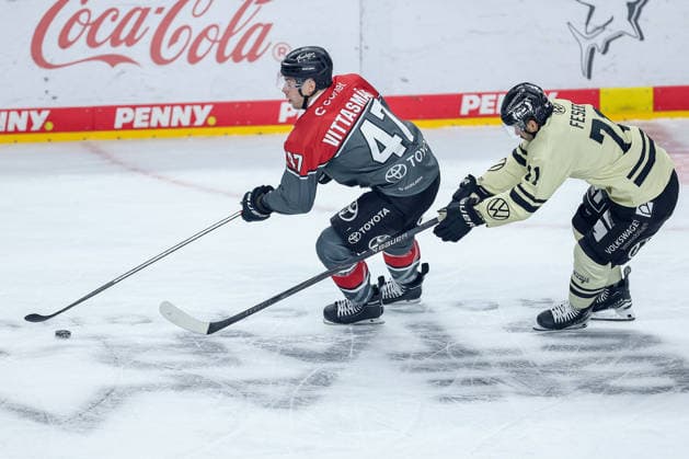 September 18, 2026, Ice Hockey, DEL, Kölner Haie vs. Grizzlys Wolfsburg, Matchday 1, 2026–27 Season, Lanxess Arena, Cologne; Veli Matti Vittasmäki (Kölner Haie, No. 47) in a battle against Justin Feser (Grizzlys Wolfsburg, No. 74), North Rhine-Westphalia, Germany