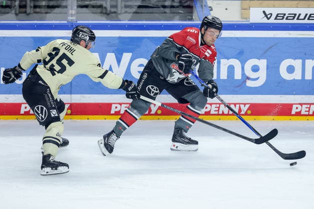 September 18, 2026, Ice Hockey, DEL, Kölner Haie vs. Grizzlys Wolfsburg, Matchday 1, 2026–27 Season, Lanxess Arena Cologne xw35 in a one-on-one battle against Juhani Tyrväinen, Kölner Haie 21, North Rhine-Westphalia, Germany