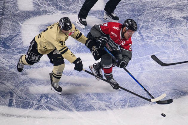 COLOGNE, GERMANY - 18 SEPTEMBER, 2026: Juhani Tyrvaeinen, Justin Feser - The PENNY DEL Ice hockey, Eishockey match Koelner Haie vs. Grizzlys Wolfsburg at LANXESS arena.  Copyright: xVitaliixKliuievx