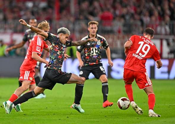 September 18, 2026, 2026–2027 Bundesliga, Matchday 4, FC Bayern Munich vs. 1. FC Union Berlin, at the Allianz Arena in Munich, Luis Diaz of FC Bayern Munich prevails against Janik Haberer of Union Berlin