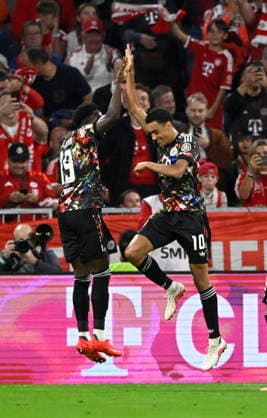 GOAL: 1-0 Jamal Musiala FC Bayern Munich FCB 10 Goal celebration Alphonso Davies Bayern Munich FCB 19 FC Bayern Munich FCB vs. 1. FC Union Berlin FCU September 18, 2026 DFL regulations prohibit any use of PHOTOGRAPHS AS IMAGE SEQUENCES AND OR QUASI-VIDEO FC Bayern Munich FCB vs. 1 FC Union Berlin FCU