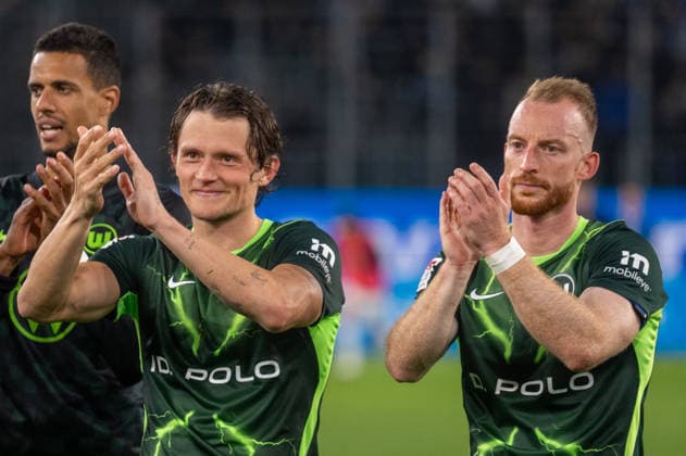 German Soccer 2. Bundesliga, Matchday 6, 2026–2027, VfL Wolfsburg vs. SV Darmstadt 98 on September 18, 2026, at the Volkswagen Arena in Wolfsburg: Fabian Reese (VfL Wolfsburg), No. 11 Maximilian Arnold (VfL Wolfsburg), No. 27—gestures, facial expressions, facial movements Copyright: xSvenxHeidmannx