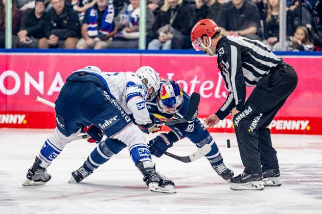 Linesman Joshua Roemer officiates a faceoff between Kristian Reichel of Adler Mannheim, 11, and Chris DeSousa of EHC Red Bull Munich, 82 (GER), EHC Red Bull Munich vs. Adler Mannheim, Ice Hockey, DEL, 2026–2027 Season, Matchday 1, September 18, 2026. Photo: HMB Media, Heike Feiner Copyright: HMBxMedia HeikexFeiner