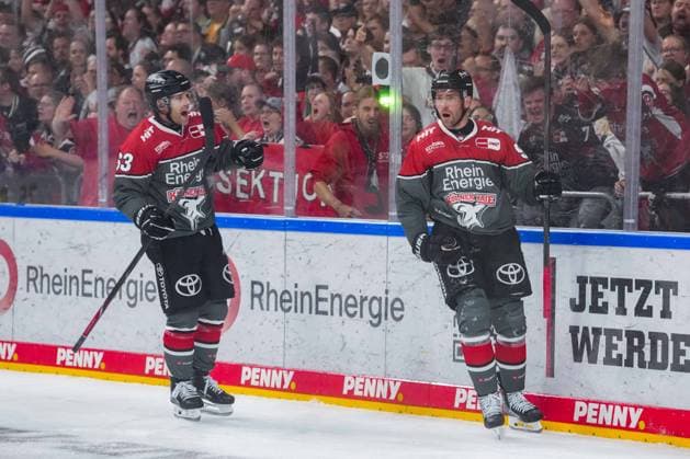 Ice Hockey: Penny DEL Matchday 1—Cologne Sharks vs. Wolfsburg Grizzlys on September 18, 2026, at the Lanxess Arena in Cologne. Marcel Noebels (Cologne), on the right, is celebrated alongside Patrick Russell (Cologne), on the left, for his goal making the score 4–6. In accordance with the regulations of the DEL (German Ice Hockey League), the publication and further use of the footage in electronic media and on devices of any kind during the game is not permitted. xDMx