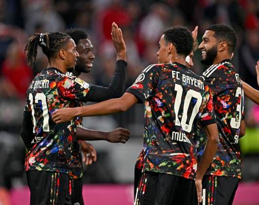 September 18, 2026, 2026–2027 Bundesliga Season, Matchday 4, FC Bayern Munich vs. FC Union Berlin, at the Allianz Arena in Munich; from left: Michael Olise (FC Bayern Munich), Alphonso Davies (FC Bayern Munich), Jamal Musiala (Bayern Munich), and Ismael Saibari (FC Bayern Munich) celebrate