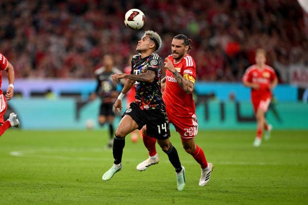 Soccer, Bundesliga 1, 2026–2027 Season, Matchday 4, September 18, 2026: FC Bayern Munich vs. 1. FC Union Berlin—Luis Díaz (left), FC Bayern Munich, vs. Christopher Trimmel (right), 1. FC Union Berlin