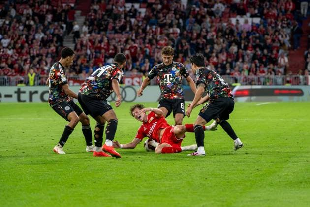 Soccer, Men s, 2026–2027 Season, Bundesliga 1, Matchday 4, FC Bayern Munich vs. 1. FC Union Berlin; from left: Jamal Musiala (Bayern Munich), Ismael Saibari (Bayern Munich), Tim Skarke (1. FC Union Berlin), Tom Bischof (Bayern Munich), Min Jae Kim (Bayern Munich), September 18, 2026, Copyright: xMatthiasxKochx