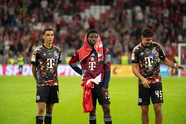 September 18, 2026: Soccer – FC Bayern Munich vs. Union Berlin, Matchday 4 of the Bundesliga at the Allianz Arena in Munich. Jamal Musiala (FC Bayern Munich, 10), Alphonso Davies (FC Bayern Munich, 19), and Aleksandar Pavlovic (FC Bayern Munich, 45 after the final whistle IMPORTANT NOTICE In accordance with DFL and DFB regulations, it is prohibited to use or allow the use of photographs taken in the stadium and or during the game in the form of sequential images and or video-like photo series Copyright: xJamesxZabelx