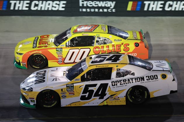 BRISTOL, TN - SEPTEMBER 18: Taylor Gray ( 54 Joe Gibbs Racing Operation 300 Toyota) races with Sheldon Creed ( 00 Haas Factory Team Ollie s Chevrolet) into turn 1 during the running of the NASCAR, Motorsport, USA O Reilly Auto Parts Series Food City 300 on September 18, 2026 at Bristol Motor Speedway in Bristol, TN. (Photo by Jeff Robinson Icon Sportswire) AUTO: SEP 18 NASCAR O’Reilly Auto Parts Series Food City 300 EDITORIAL USE ONLY Icon2609184019300