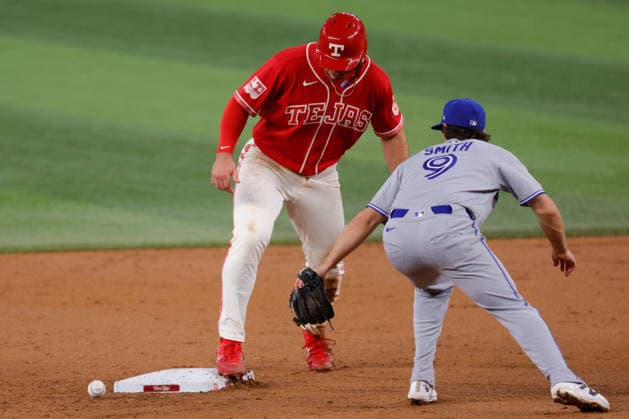 September 18, 2026, Arlington, Texas, USA: Texas Rangers left fielder WYATT LANGFORD (36) steals second base in a baseball game, Friday, September 18, 2026, in Arlington, Texas. Arlington USA - ZUMAa325 20260918_zsa_a325_033 Copyright: xDavidxBalleringxIix