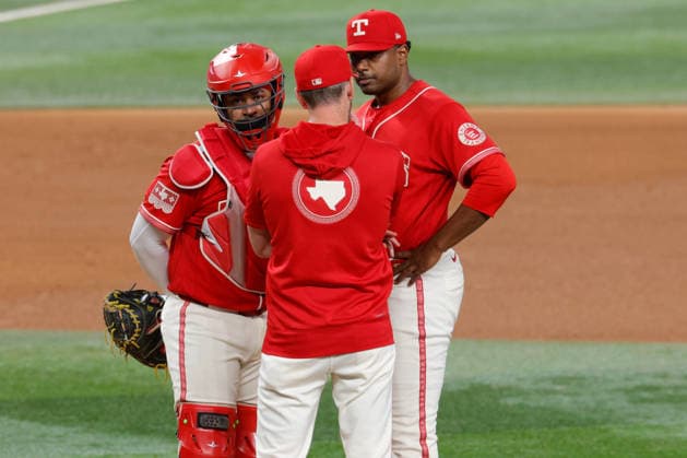 September 18, 2026, Arlington, Texas, USA: Texas Rangers pitching coach JORDAN TIEGS (83) visits the mound in a baseball game, Friday, September 18, 2026, in Arlington, Texas. Arlington USA - ZUMAa325 20260918_zsa_a325_038 Copyright: xDavidxBalleringxIix