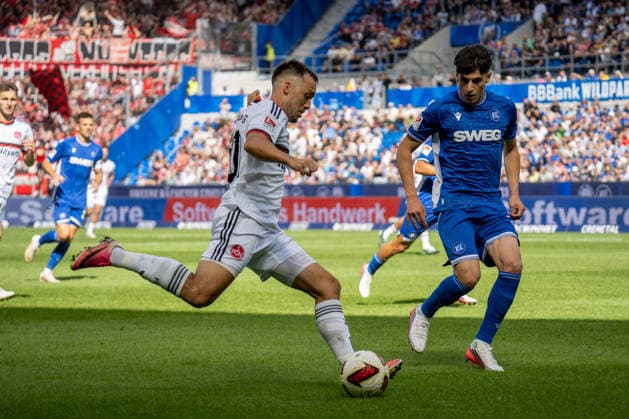 September 19, 2026, xdaymx, Soccer 2. Bundesliga, Karlsruher SC vs. 1. FC Nürnberg Julian Justvan of 1. FC Nürnberg delivers a cross DFL DFB REGULATIONS PROHIBIT ANY USE OF PHOTOGRAPHS as IMAGE SEQUENCES and or QUASI-VIDEO Karlsruhe