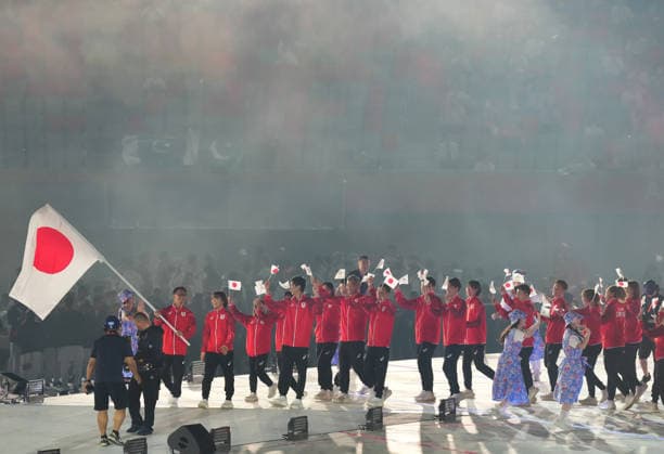 (260919) -- NAGOYA, Sept. 19, 2026 -- The delegation of Japan parades into the stadium during the opening ceremony of the 20th Asian Games Aichi-Nagoya 2026 in Nagoya, Japan, Sept. 19, 2026. ) (SP)JAPAN-NAGOYA-ASIAN GAMES-OPENING CEREMONY LuixSiuxWai 